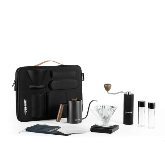 MHW-3BOMBER pour-over set: black carrying case, gooseneck kettle, grinder, dripper. Portable coffee brewing for enthusiasts.