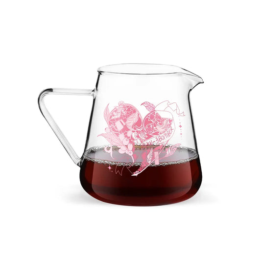 MHW-3BOMBER Flipped glass coffee server with a pink floral motif, filled with coffee