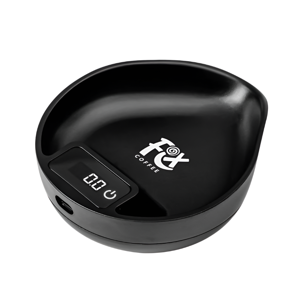 FIX COFFEE ProDose Scale. Black, digital coffee scale with a built-in tray and digital display.