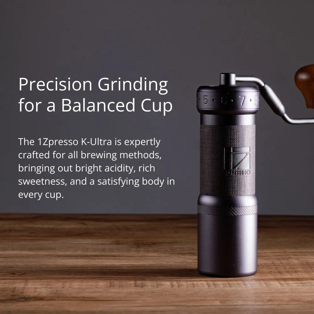 1Zpresso K-Ultra manual coffee grinder. Dark gray, compact, with grind settings & wooden handle. Precision brewing tool.