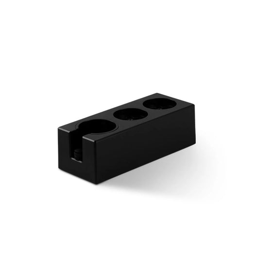 MHW-3BOMBER black ABS portafilter holder/tamper station with 3 slots. A coffee accessory for 51-58mm portafilters.
