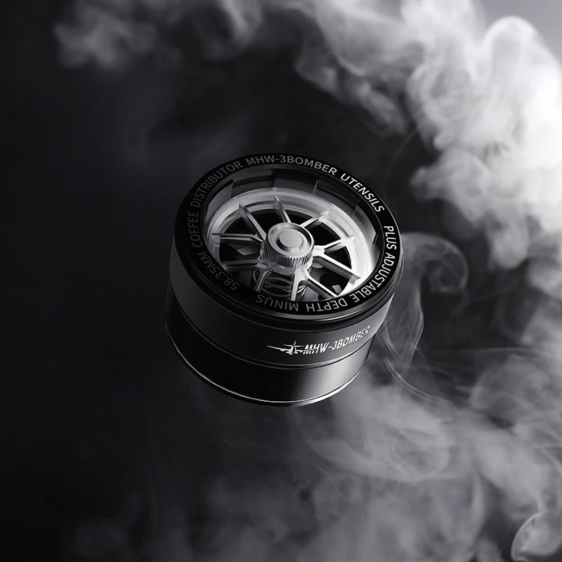 MHW-3BOMBER black coffee distributor with silver detail. Adjustable depth and unique wheel hub design.