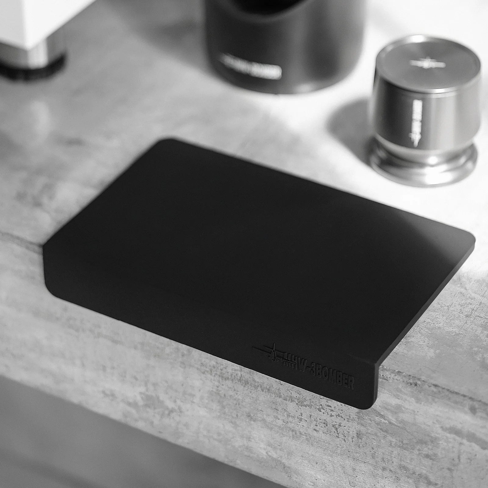 MHW-3BOMBER black silicone coffee tamper mat. Rectangular, protects counters. 