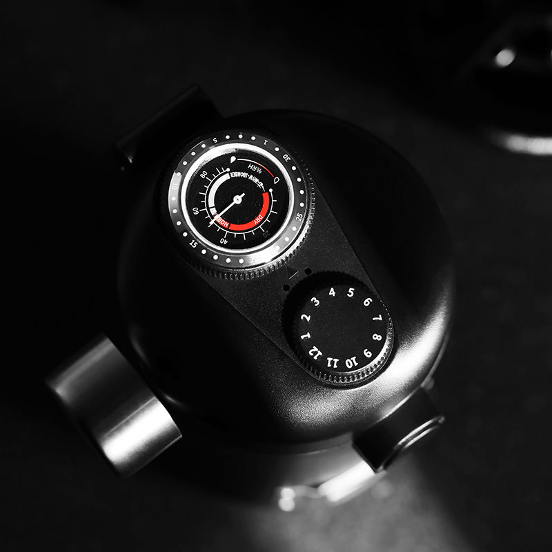 MHW-3BOMBER Gambo Coffee Canister top view. Black storage container with gauges to track humidity and roasting date.
