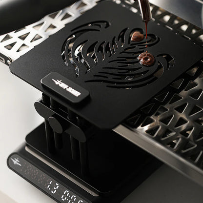 MHW-3BOMBER black coffee scale stand with adjustable height and a decorative eagle cutout on top.