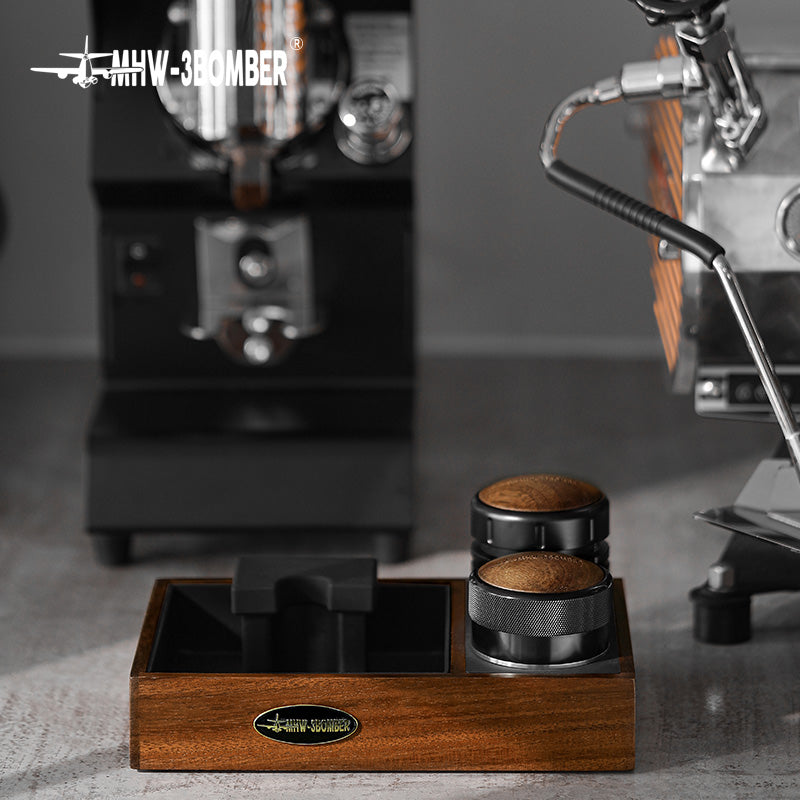 MHW-3BOMBER espresso tamping station with wooden base and portafilter holder. Compact design for 51-58mm portafilters.