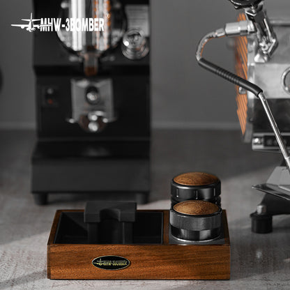 MHW-3BOMBER espresso tamping station with wooden base and portafilter holder. Compact design for 51-58mm portafilters.