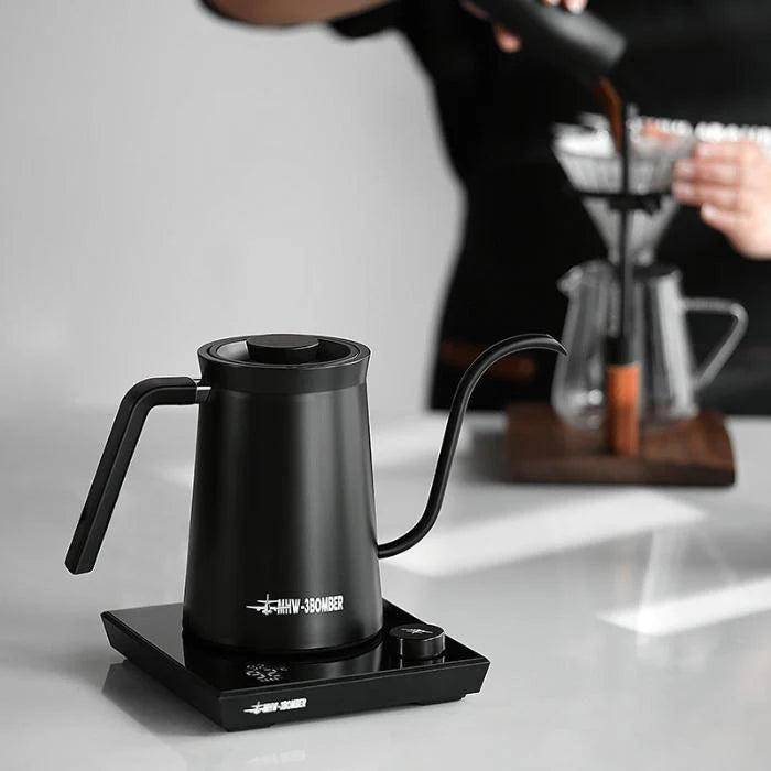 MHW-3BOMBER black gooseneck electric kettle with temperature control on a base. Precision pour kettle on counter.