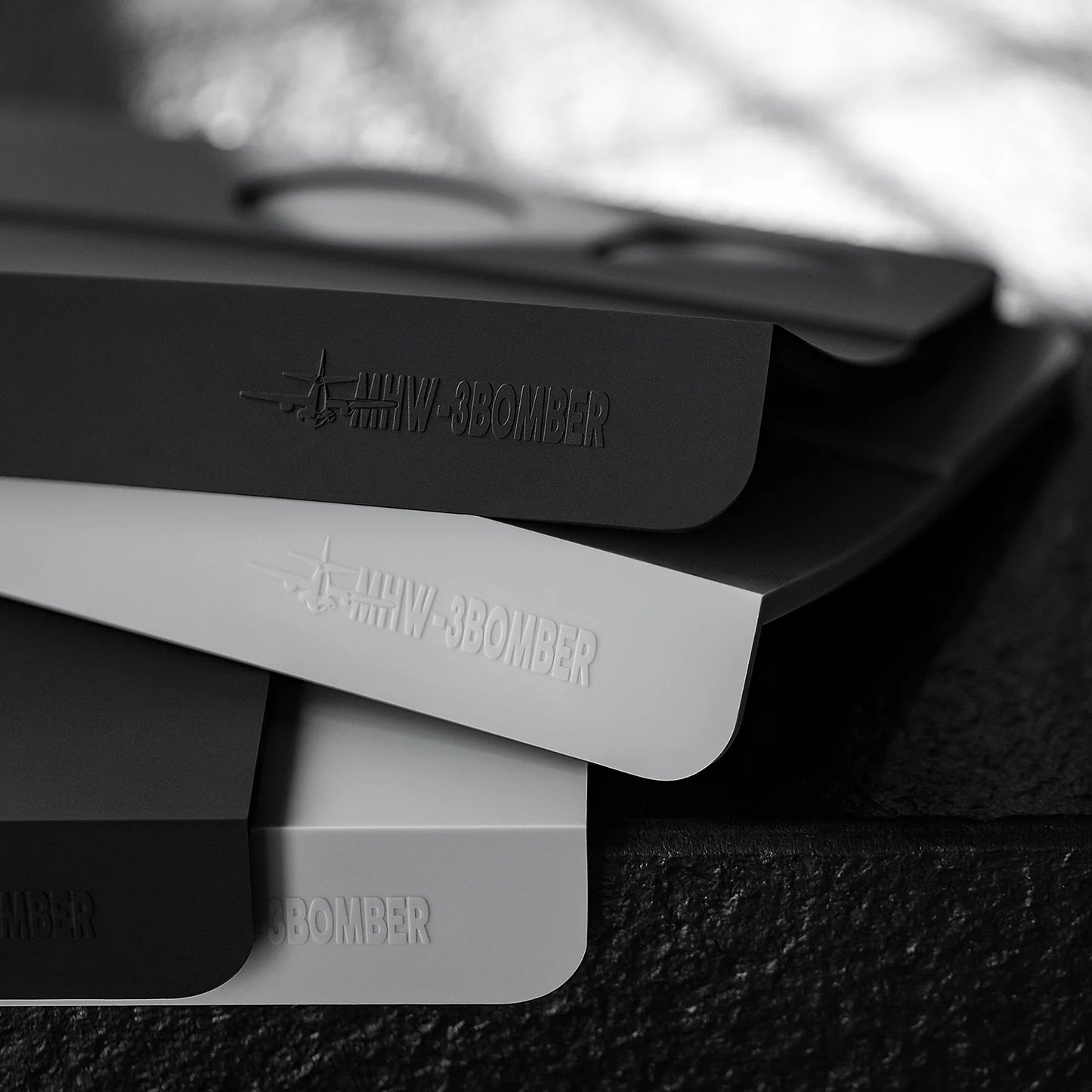 MHW-3BOMBER silicone tamper mats in gray and black. Coffee tamper mat, food-grade, durable.