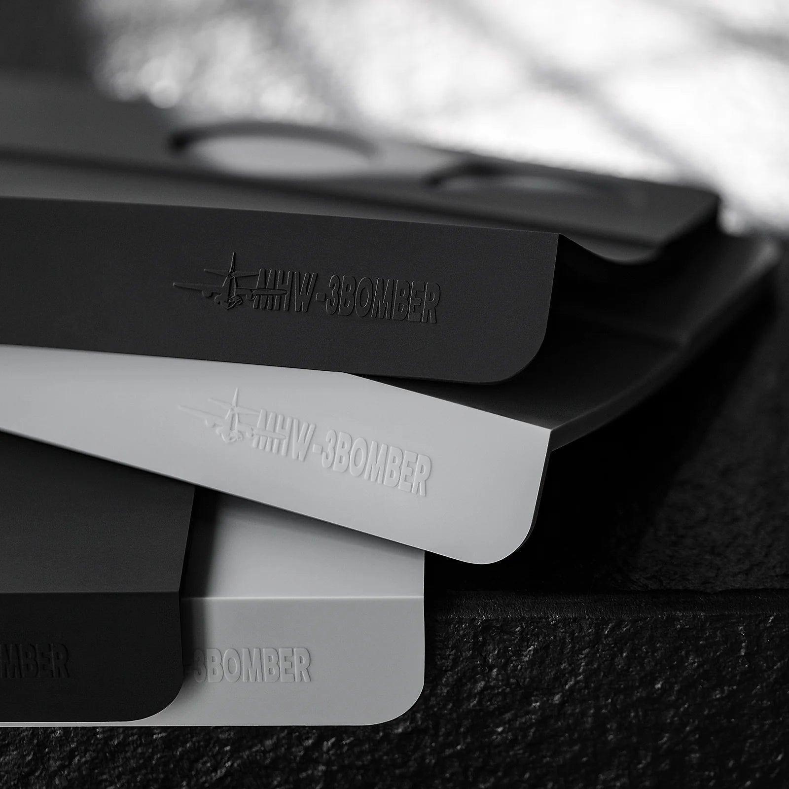 MHW-3BOMBER silicone tamper mats in gray and black. Coffee tamper mat, food-grade, durable.