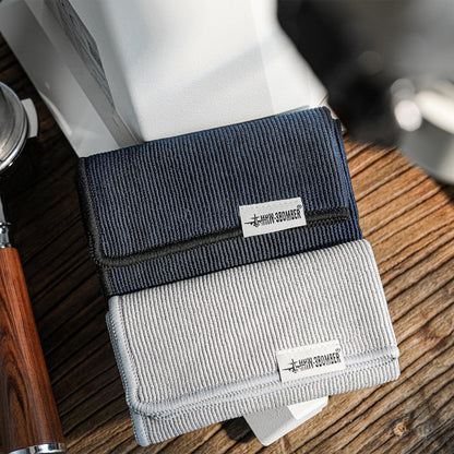 MHW-3BOMBER Barista Towels: Blue and gray textured cloths with logo. Coffee bar accessory.