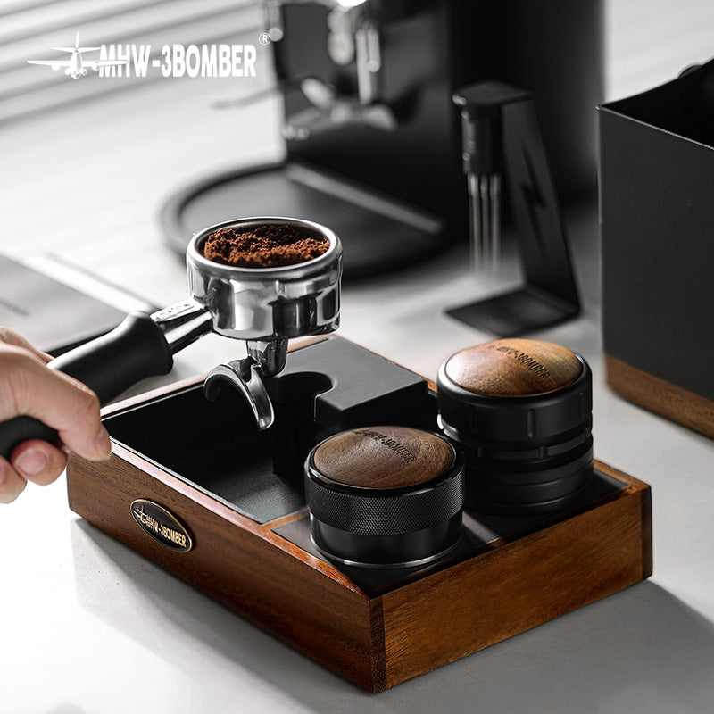 MHW-3BOMBER espresso tamping station with portafilter, tamper, and wood base. Coffee accessories organizer.
