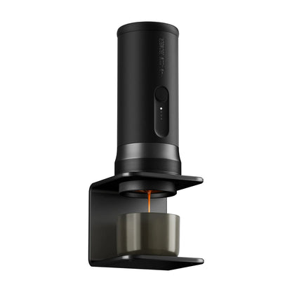 Black coffee brewing device with a lit orange indicator on a white background