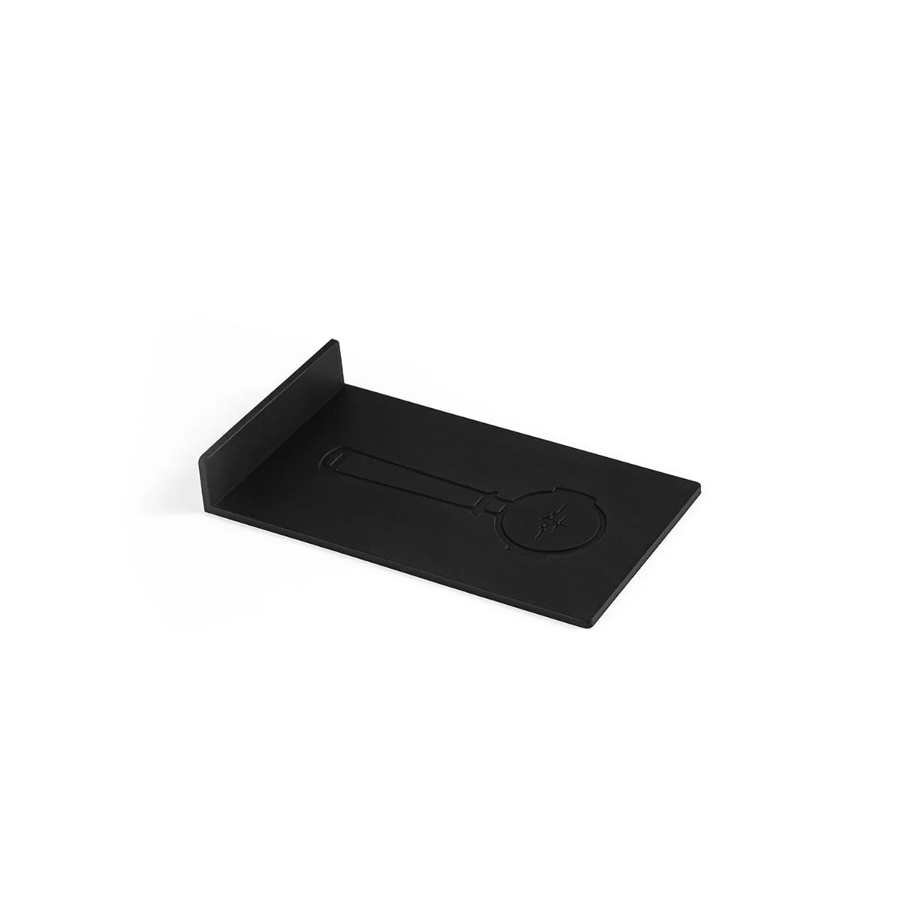 The MHW-3BOMBER Espresso Scale Cube Coffee Scale 2.0 features a sleek black mat with an embossed magnifying glass design, a raised edge for convenience, and USB rechargeability, all set against a plain white background.