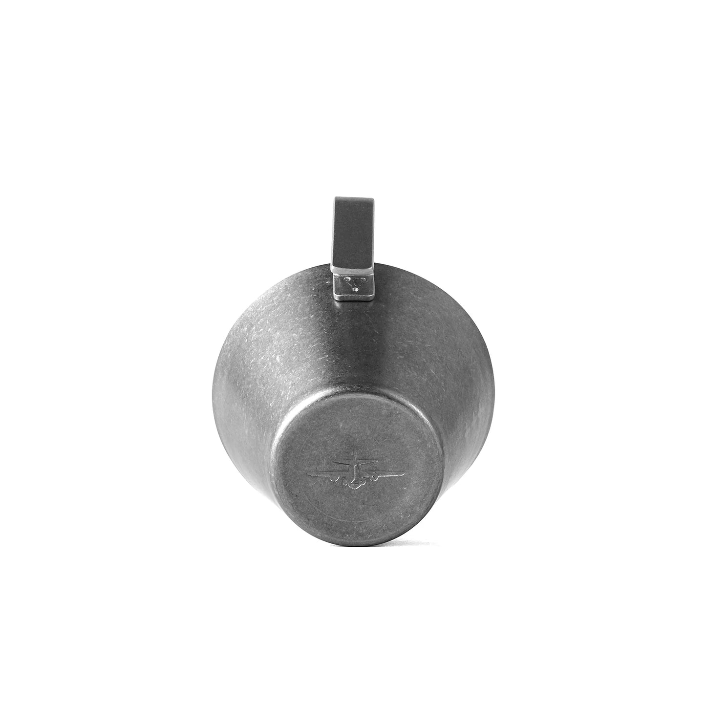 The MHW-3BOMBER Stainless Steel Measuring Cup, with its round-bottom design, sturdy handle, and subtle base engraving, is shown from below against a plain white background.
