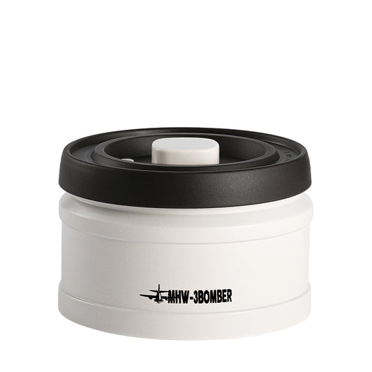 MHW-3BOMBER white coffee vacuum canister with black lid. Keeps beans fresh longer.