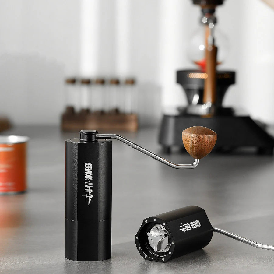 MHW-3BOMBER Adder V3 black manual coffee grinder with wooden handle. Stainless steel burr, point adjustment.