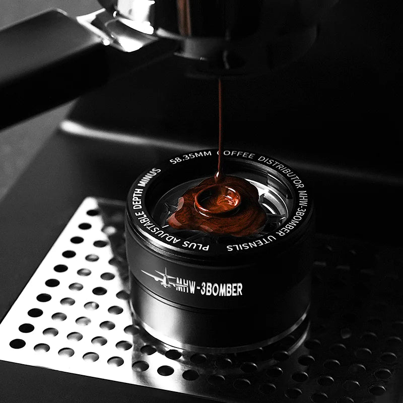 MHW-3BOMBER coffee distributor being used. Black adjustable leveler tool for espresso. 