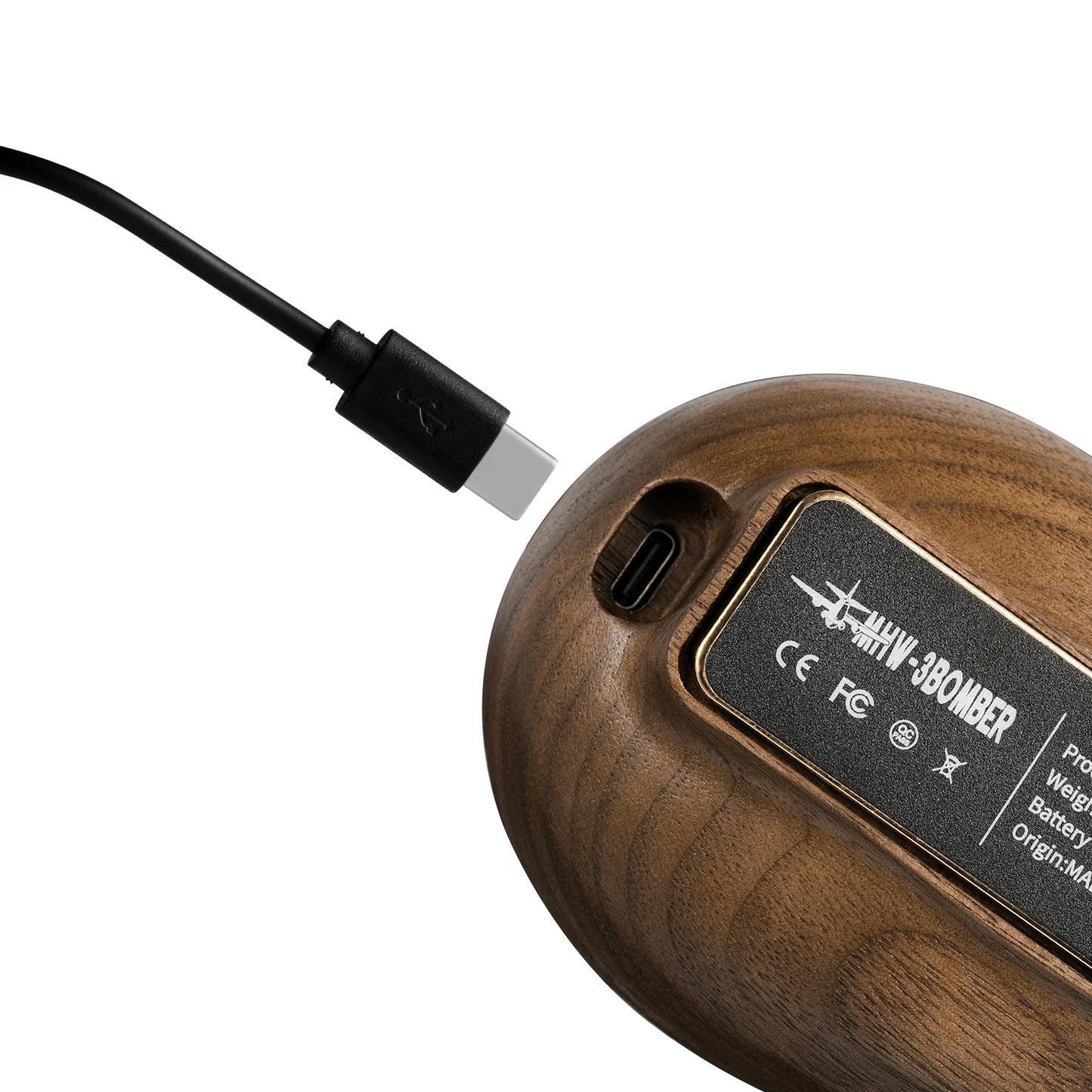 A wooden wireless mouse with a USB-C port is shown, its elegant design echoing that of a meticulously crafted MHW-3BOMBER Ovo Coffee Scale. Nearby rests a black USB-C cable, while model certifications are prominently displayed on the back.
