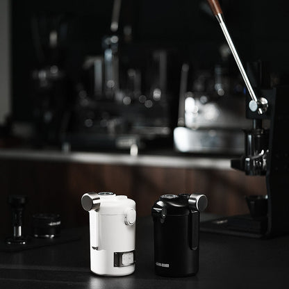 MHW-3BOMBER Gambo sealed coffee canisters in white and black on a counter. 