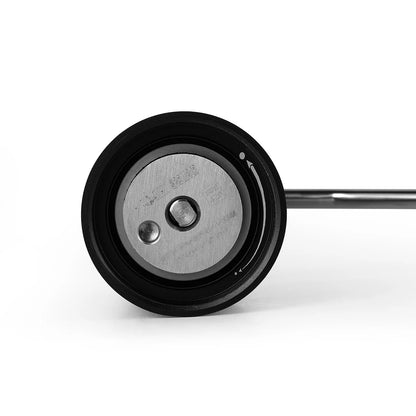 Bottom view of the MHW-3BOMBER M1 Manual Coffee Grinder in black, highlighting its precision-engineered stainless steel burr system for uniform and efficient grinding.