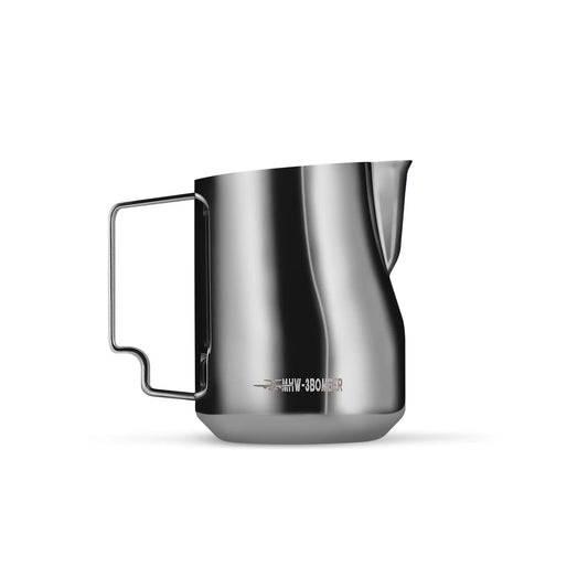 The MHW-3BOMBER Turbo Milk Pitcher Glossy, crafted in stainless steel and featuring a sleek, minimalistic design with a spout and handle, shines in silver-gray against a white backdrop—perfect for latte art.