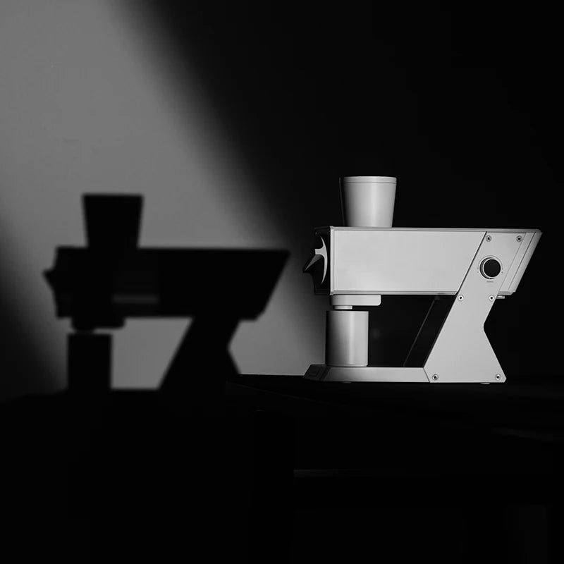 MHW-3BOMBER F74 white electric coffee grinder with titanium burrs and stepless adjustment, shown in studio lighting.