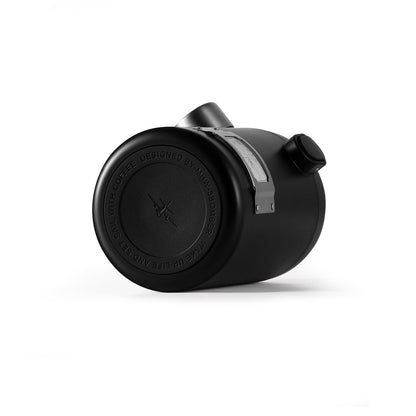 MHW-3BOMBER Gambo coffee canister. Black cylinder with metal detail. Sealed storage for coffee beans.