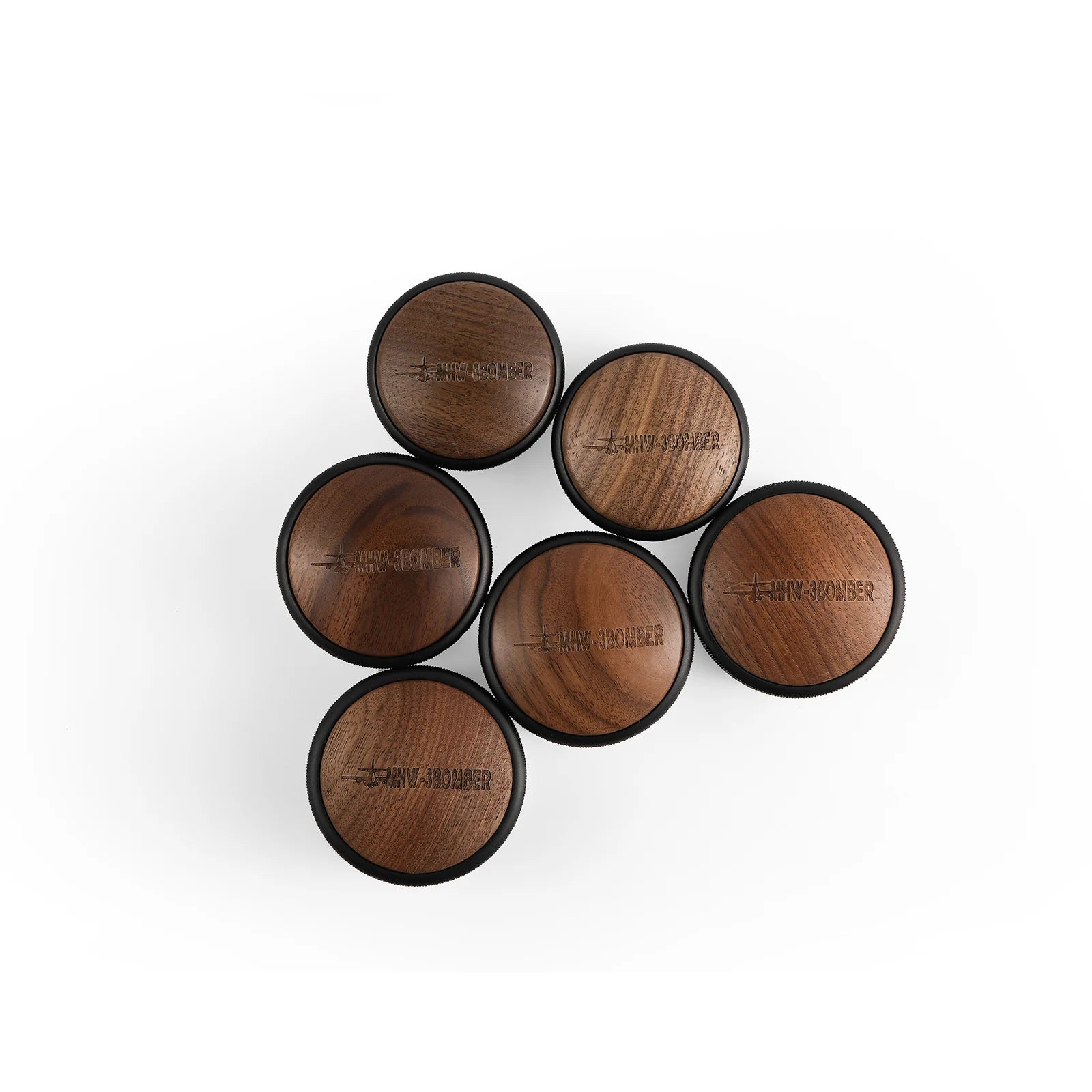 MHW-3BOMBER coffee distributor lids, wood with logo detail, round shape. Accessories for espresso brewing.