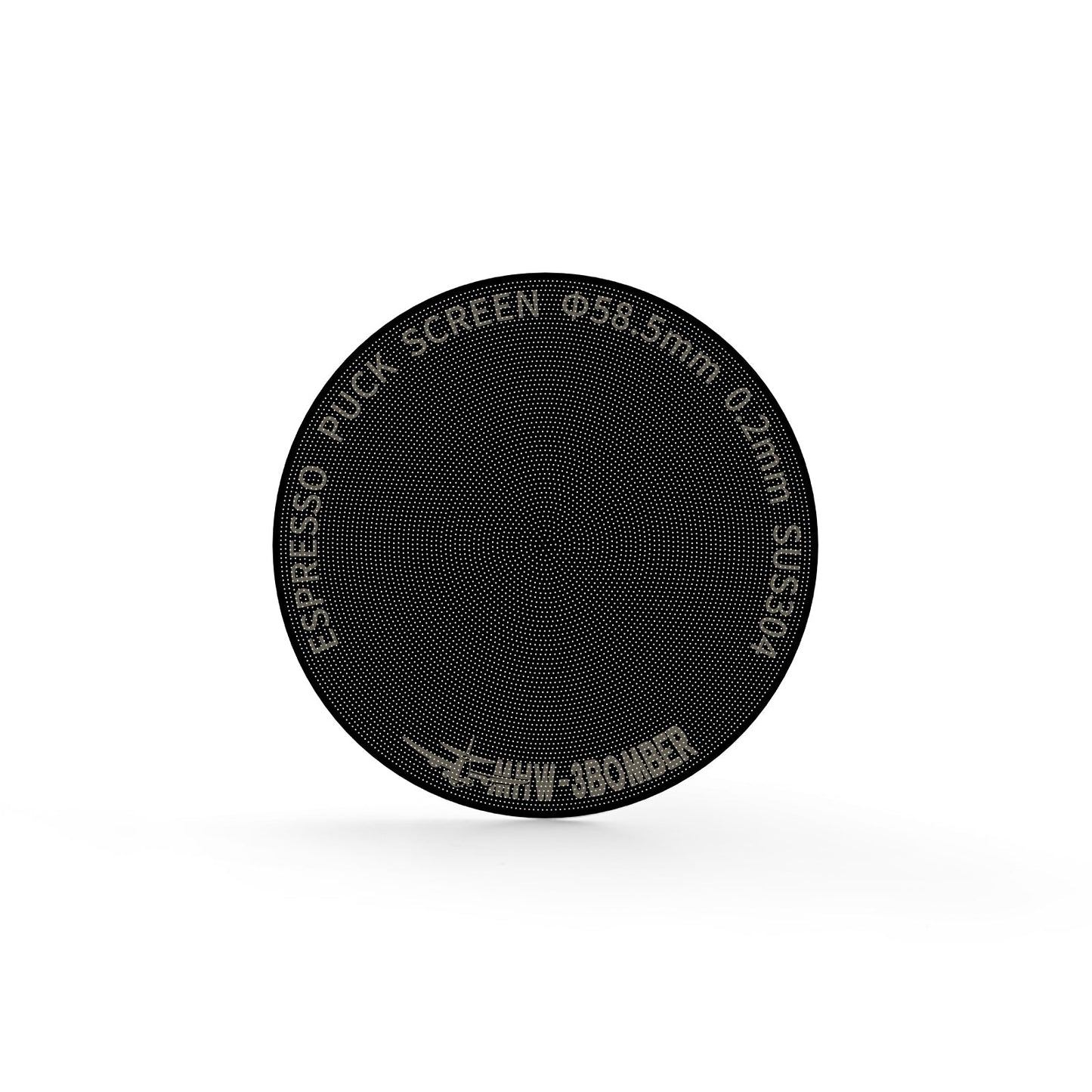 A close-up of the MHW-3BOMBER Espresso Puck Screen Titanium Plated Black shows its double-layer design with perforated holes. Text on the edge reads ESPRESSO PUCK SCREEN Φ58.5mm 0.2mm THIN BOOMER. The titanium-coated screen is set against a white background.