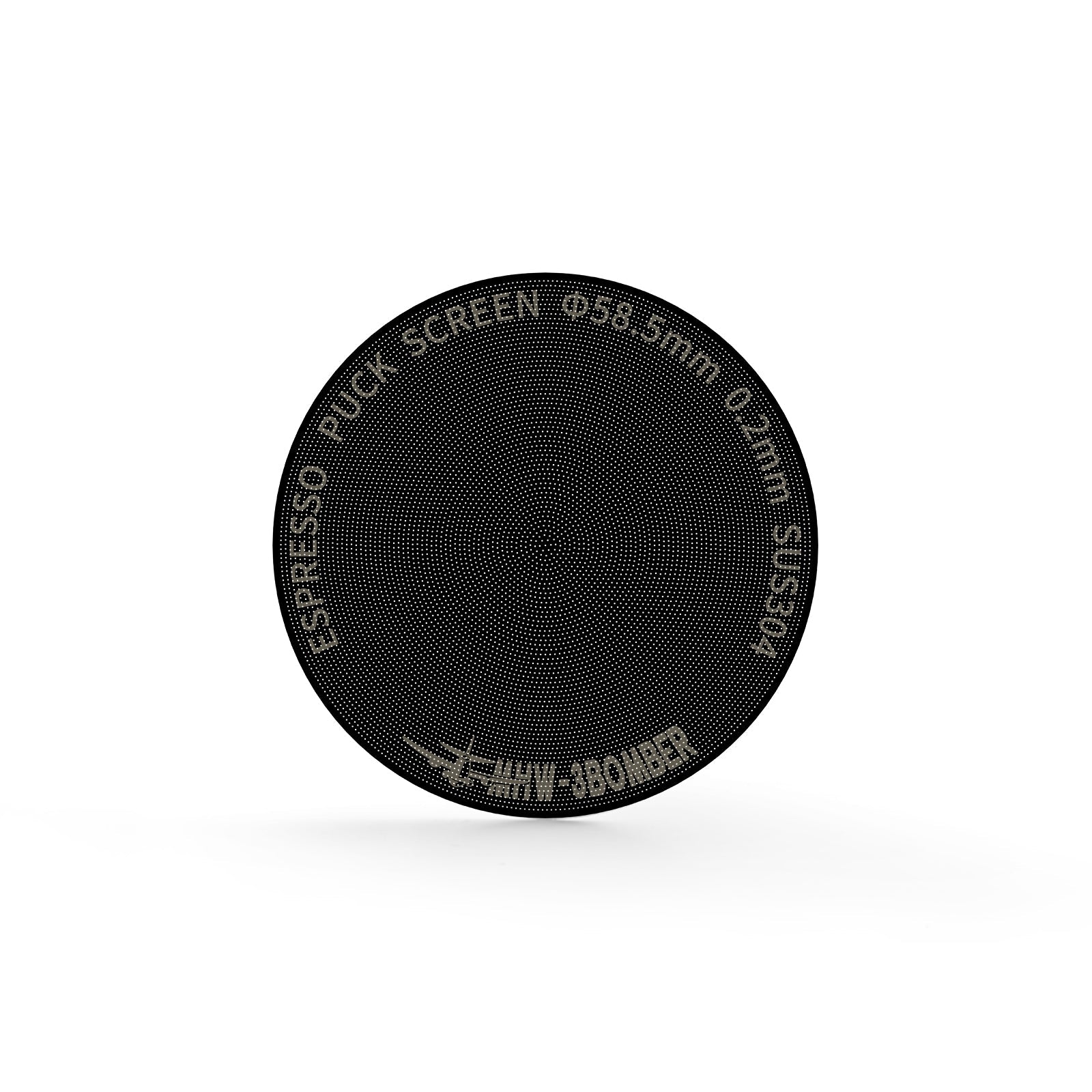 A close-up of the MHW-3BOMBER Espresso Puck Screen Titanium Plated Black shows its double-layer design with perforated holes. Text on the edge reads ESPRESSO PUCK SCREEN Φ58.5mm 0.2mm THIN BOOMER. The titanium-coated screen is set against a white background.