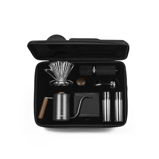 MHW-3BOMBER Pour-Over Set in black case. Includes dripper, kettle, grinder, spoon, server. Portable coffee brewing kit.