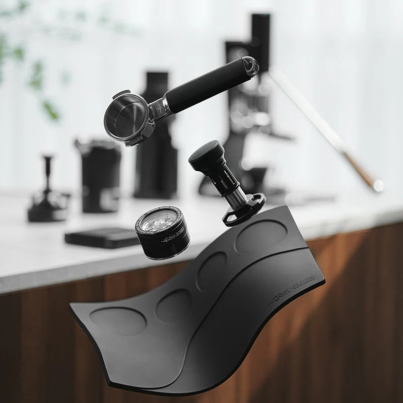 MHW-3BOMBER YU Series tamping base. Black silicone mat with slots for portafilter, tamper and WDT tools. 