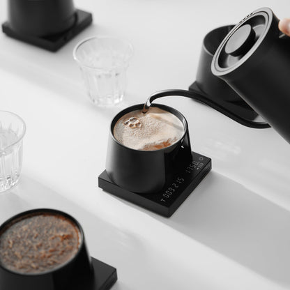 MHW-3BOMBER cupping bowl pouring water into coffee