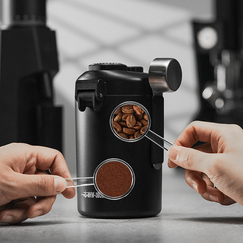 MHW-3BOMBER black Gambo coffee canister with magnetic spoon. Stores beans and grounds. Date recording discs.