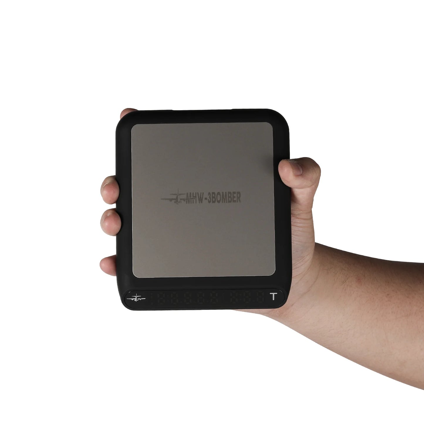 MHW-3BOMBER smart coffee scale in hand. Black frame, gray weighing surface, auto-timing, and ratio display features.