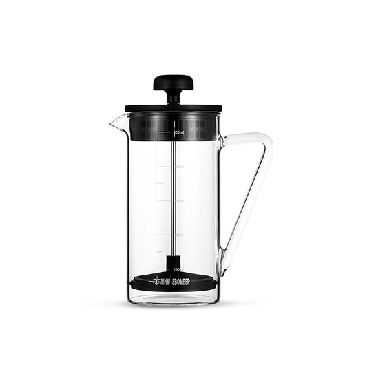 The MHW-3BOMBER Gimme French Press boasts heat-resistant glass with a black lid and knob, measurement markings, convenient spout, and transparent handle. Its stainless steel filter elevates the sleek design, offering an exceptional brewing experience.