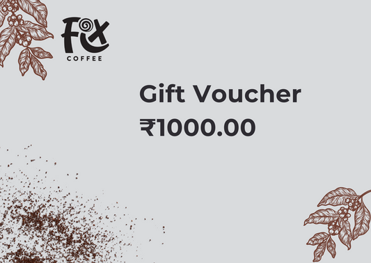 Fix Coffee gift card for ₹1000.00. Grey card with Fix Coffee logo, coffee beans and leaves graphics.