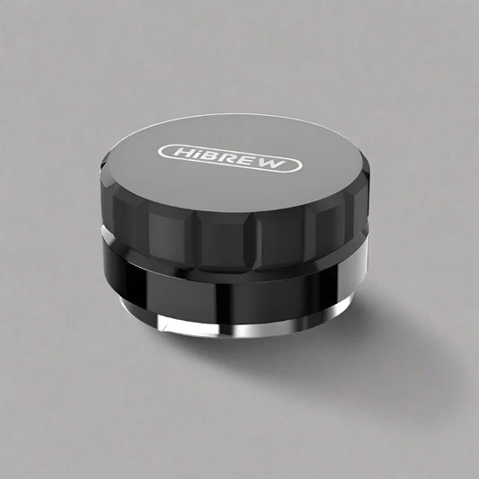 High-quality coffee distributor tool with an adjustable base, designed for even coffee ground distribution in espresso preparation, enhancing flavor extraction for barista-level results.