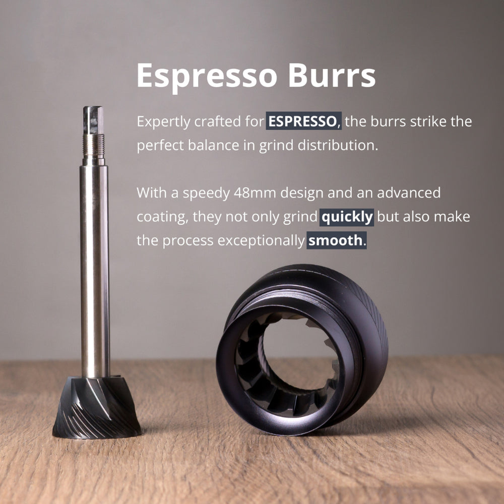1Zpresso J-Ultra grinder burrs: stainless steel center burr & black outer burr for espresso, on wood surface. 