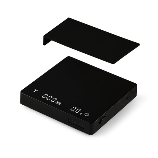 The MHW-3BOMBER Cube Coffee Scale 2.0 Mini boasts a sleek black design with a removable cover, high precision, an LCD display for weight and timer functions, and USB rechargeability for convenience.