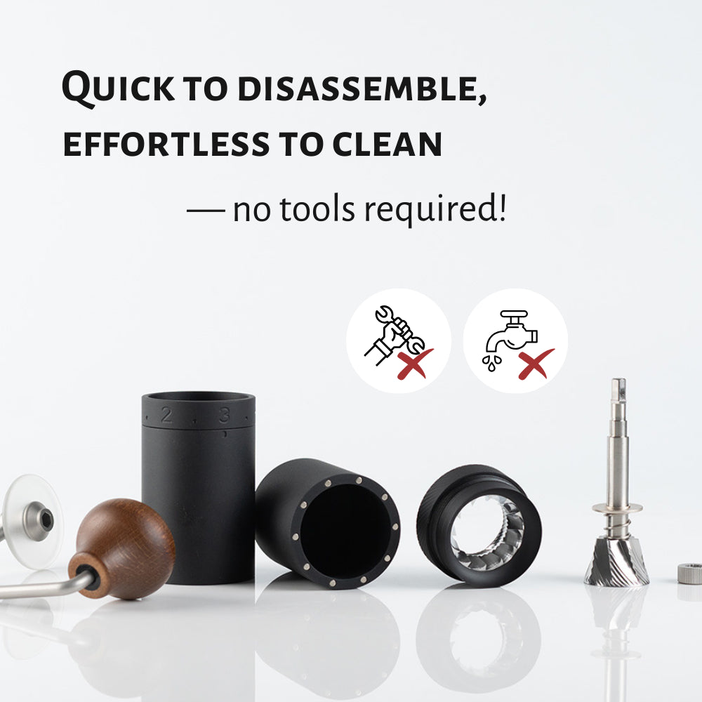1Zpresso X-Ultra disassembled manual coffee grinder. Black, with wood handle. Easy to clean design. 