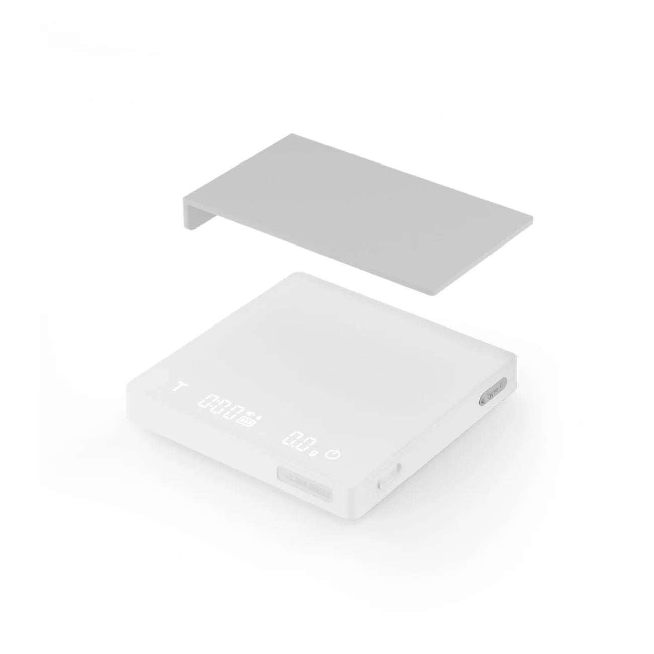 The MHW-3BOMBER Espresso Scale Cube Coffee Scale 2.0 by MHW-3BOMBER is a minimalist electronic scale with a high-precision digital display, featuring a sleek white design and USB rechargeability. It includes a gray rectangular cover, all set against a plain white background.