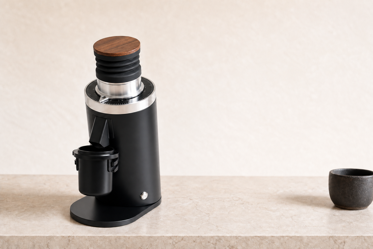 Black DF64 Gen 2 on a stone counter, with reference-matched triangular collar pointer, suspended dosing cup and oval base (reference render)