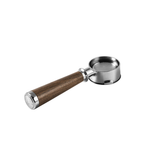 The MHW-3BOMBER Bottomless Portafilter, featuring a natural walnut wood handle and stainless steel basket, is displayed against a white background. Its sleek, modern design highlights the polished metal finish and smooth wooden texture.