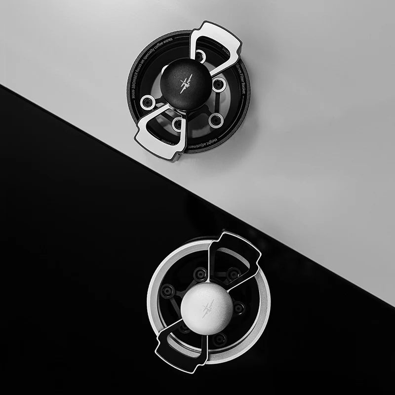 MHW-3BOMBER SE Pro WDT tool: Black/silver needle distributor with adjustable depth for espresso on gray/black surface.